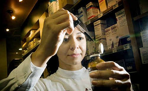 Pharmacist Maria Espinoza from the Range Pharmacy prepares a flavour to be added an otherwise nasty-tasting medicine. Pharmacist Maria Espinoza from the Range Pharmacy prepares a flavour to be added an otherwise nasty-tasting medicine.